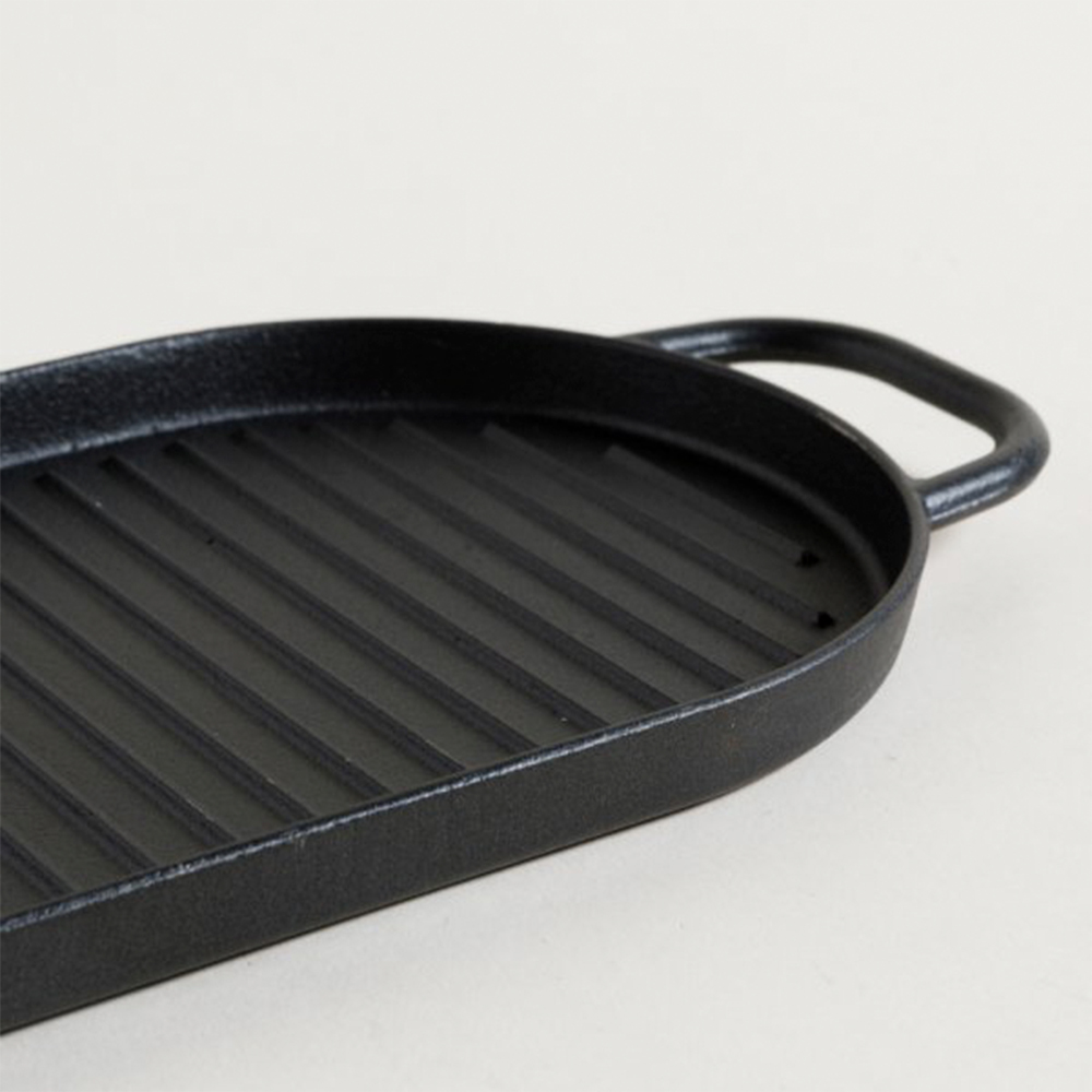 PLANCHA FUNDICION OVAL CON ASAS 30X16,50 CM